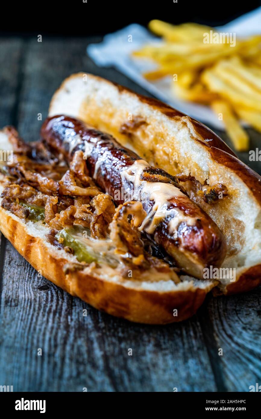 Hot Dog with Caramelized Onion, Cheddar and Gruyere Cheese Sauce on