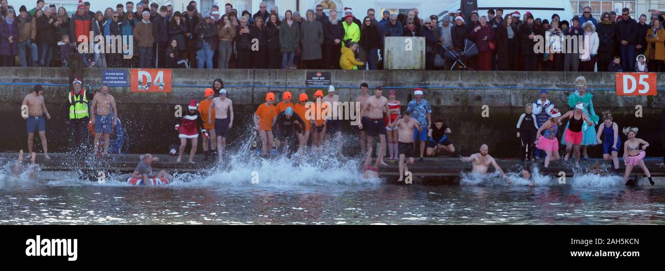 Weymouth Cross Harbour Christmas Day Swim, Dorset. Credit: Dorset Media Service/Alamy Live News Stock Photo