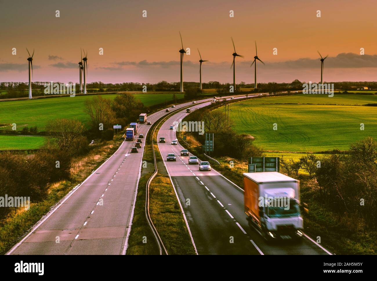 Traffic on a dual carriageway on a winter evening. Stock Photo
