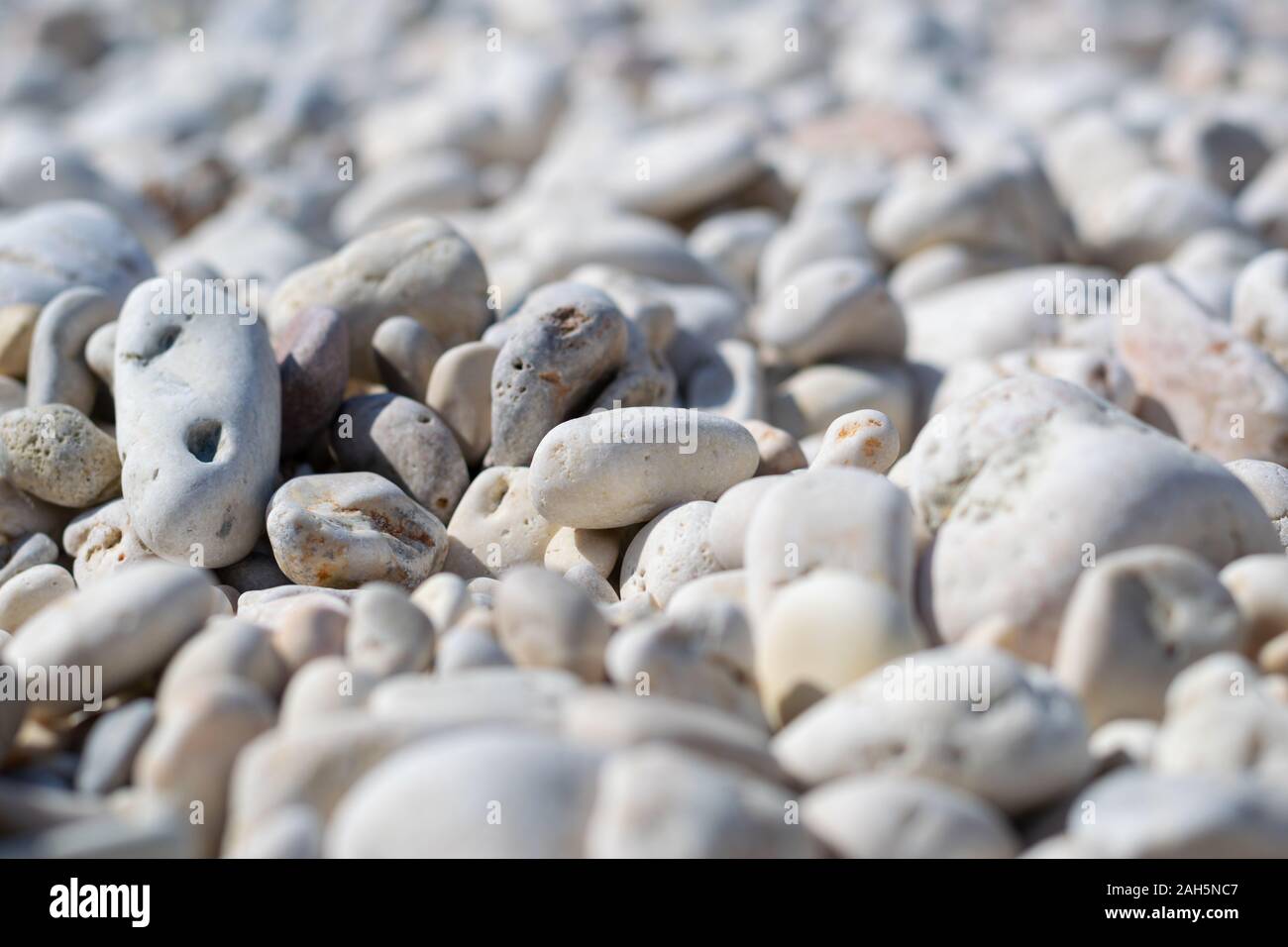 White pebbles background, soft focus Stock Photo
