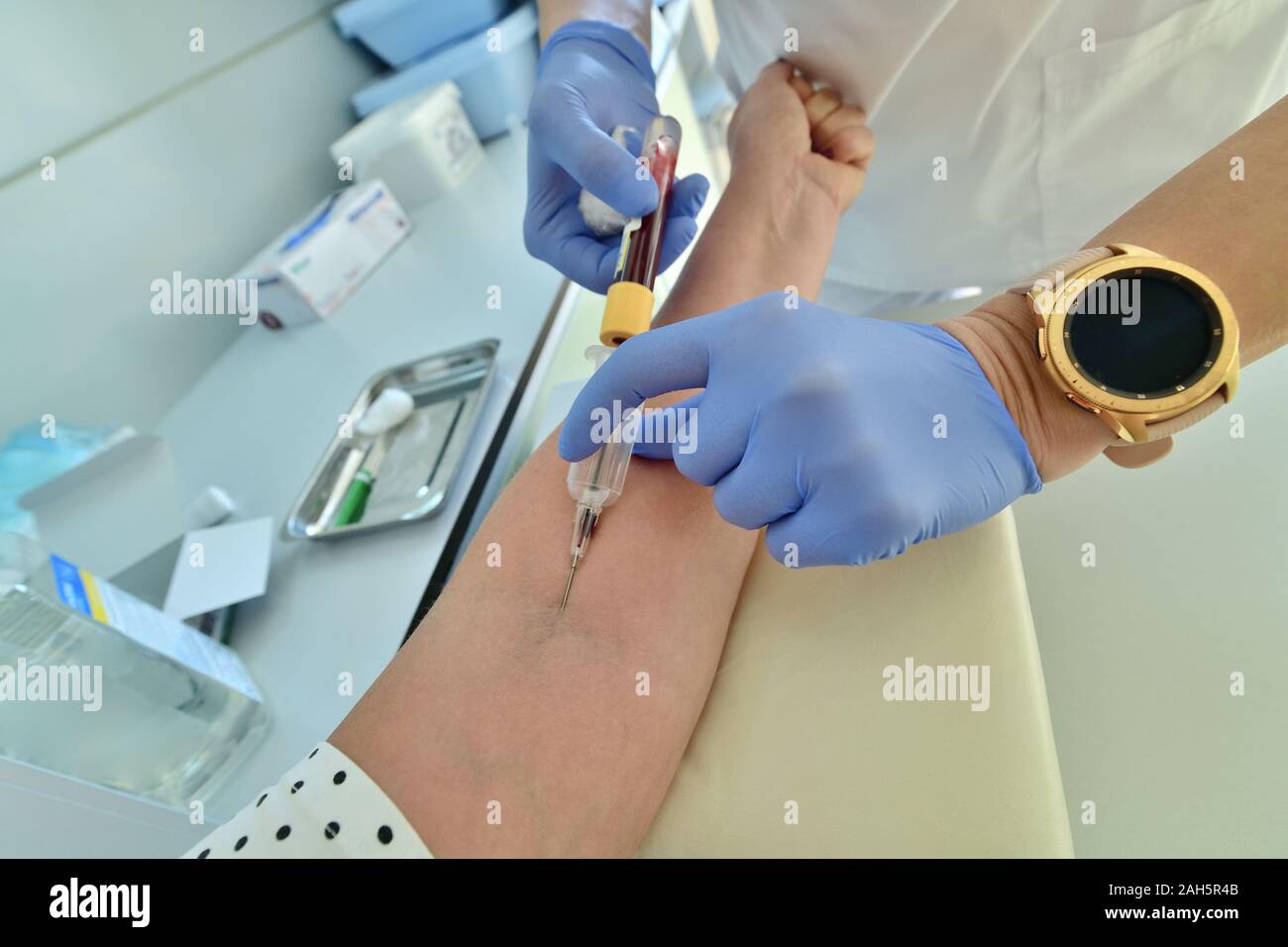 Doctor takes blood from a vein for analysis Stock Photo Alamy