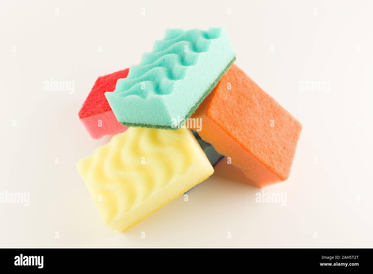 colorful foam rubber sponges isolated on a white background for washing dishes Stock Photo