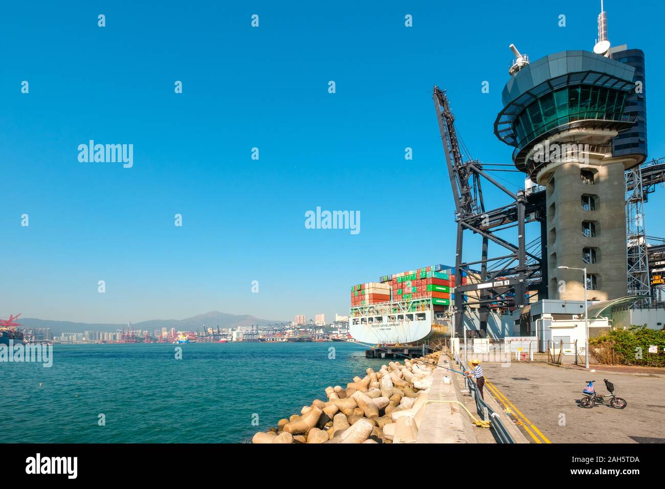 HongKong, China - November 2019: Stacked containers on container ship near freight harbour logistics centre in Hong Kong Stock Photo