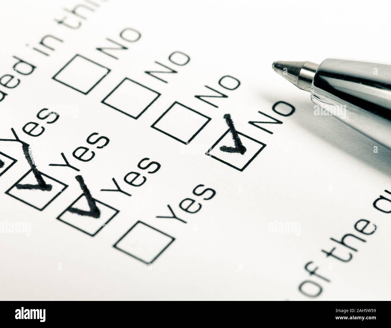 close-up-shot-of-filled-check-boxes-with-pen-stock-photo-alamy