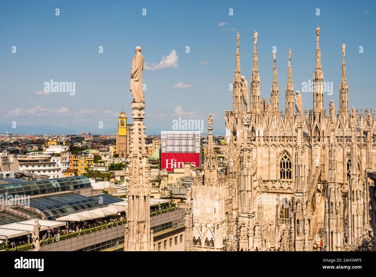 Architectural details with statues on the top of beautiful building of