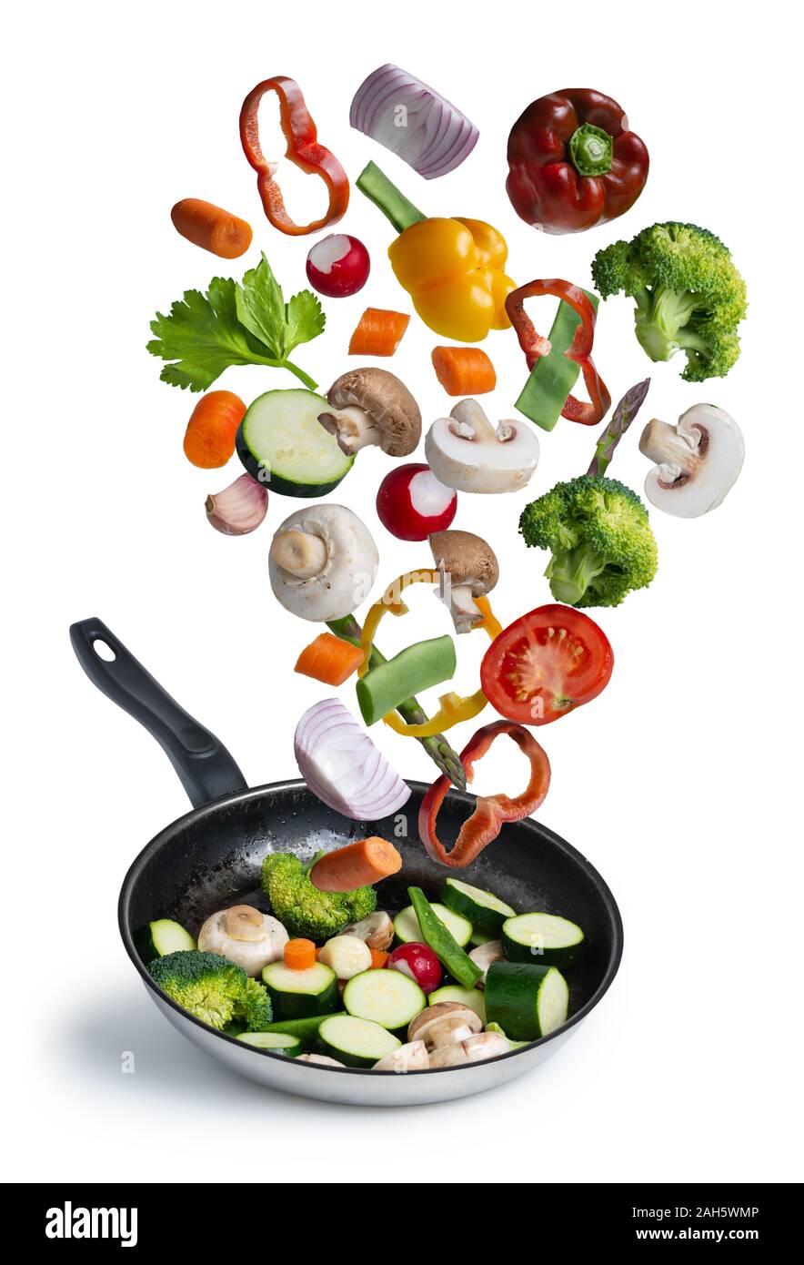 grilled fresh vegetables flying isolated on white background Stock Photo