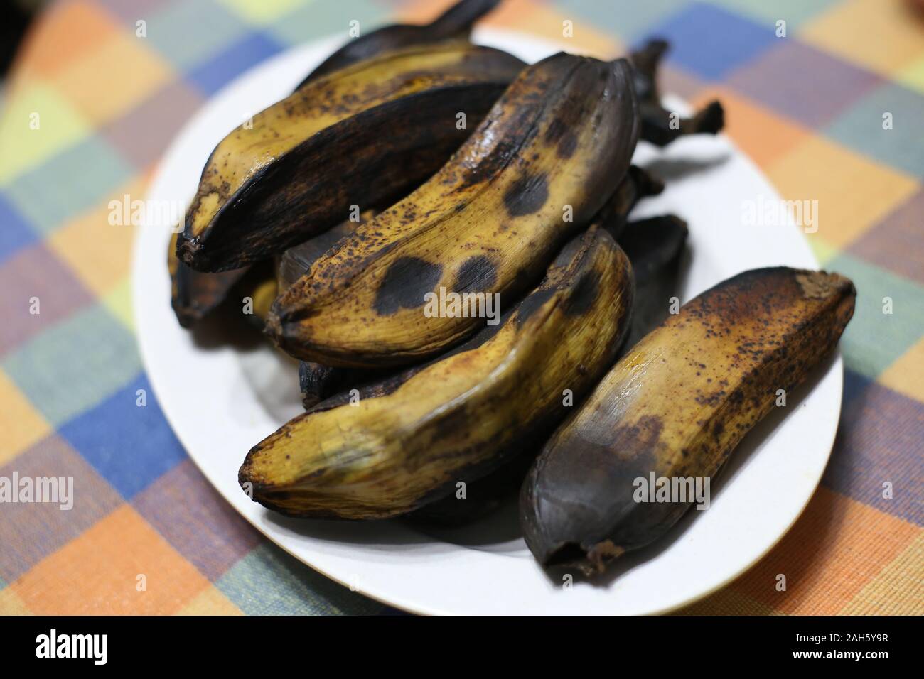 Boiled banana (pisang rebus) on the white plate. Stock Photo