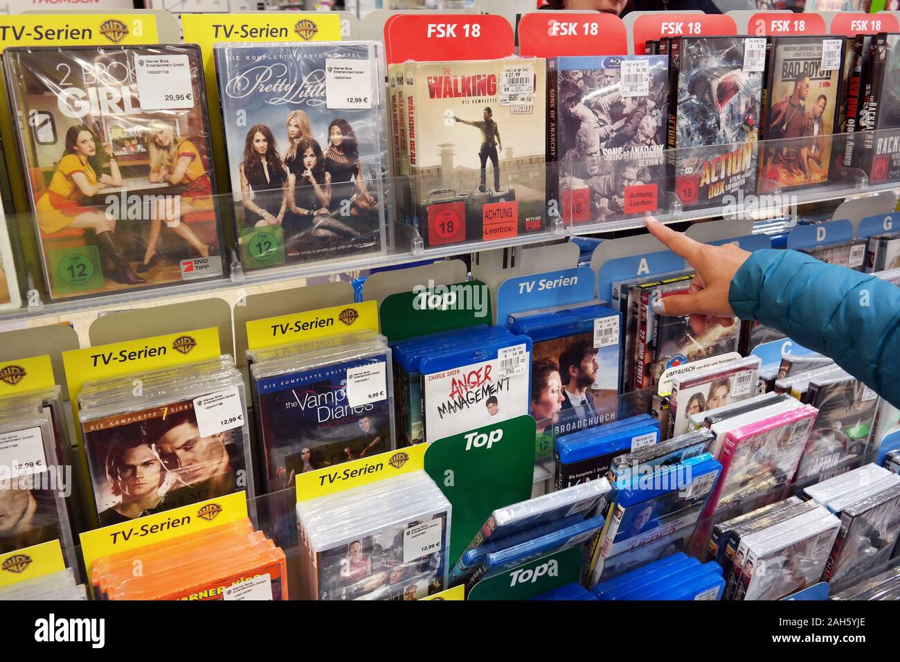Bluray Discs and DVDs in a store Stock Photo Alamy