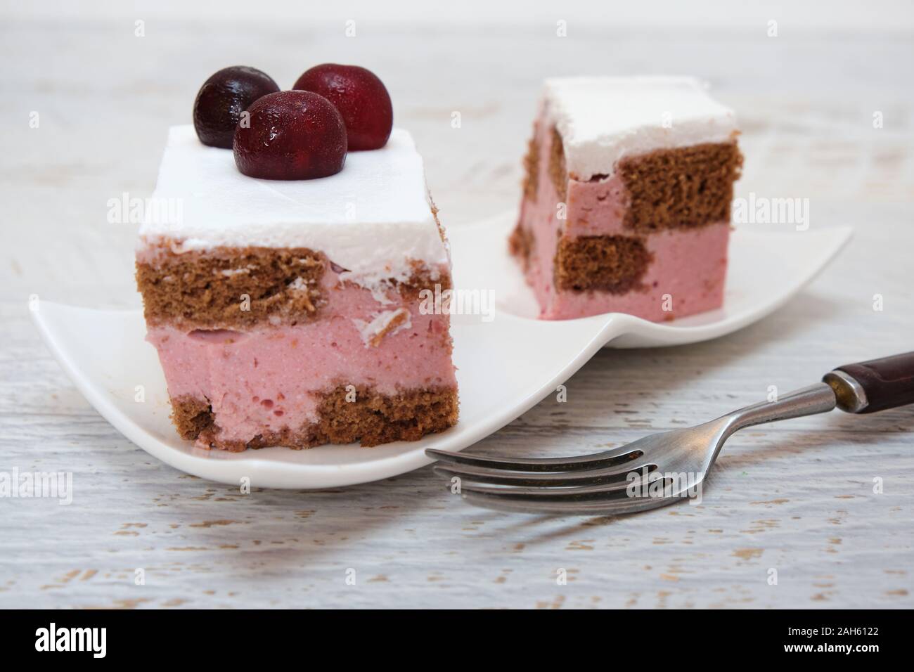 Cherry yogurt cake decorated with fresh fruits Stock Photo - Alamy