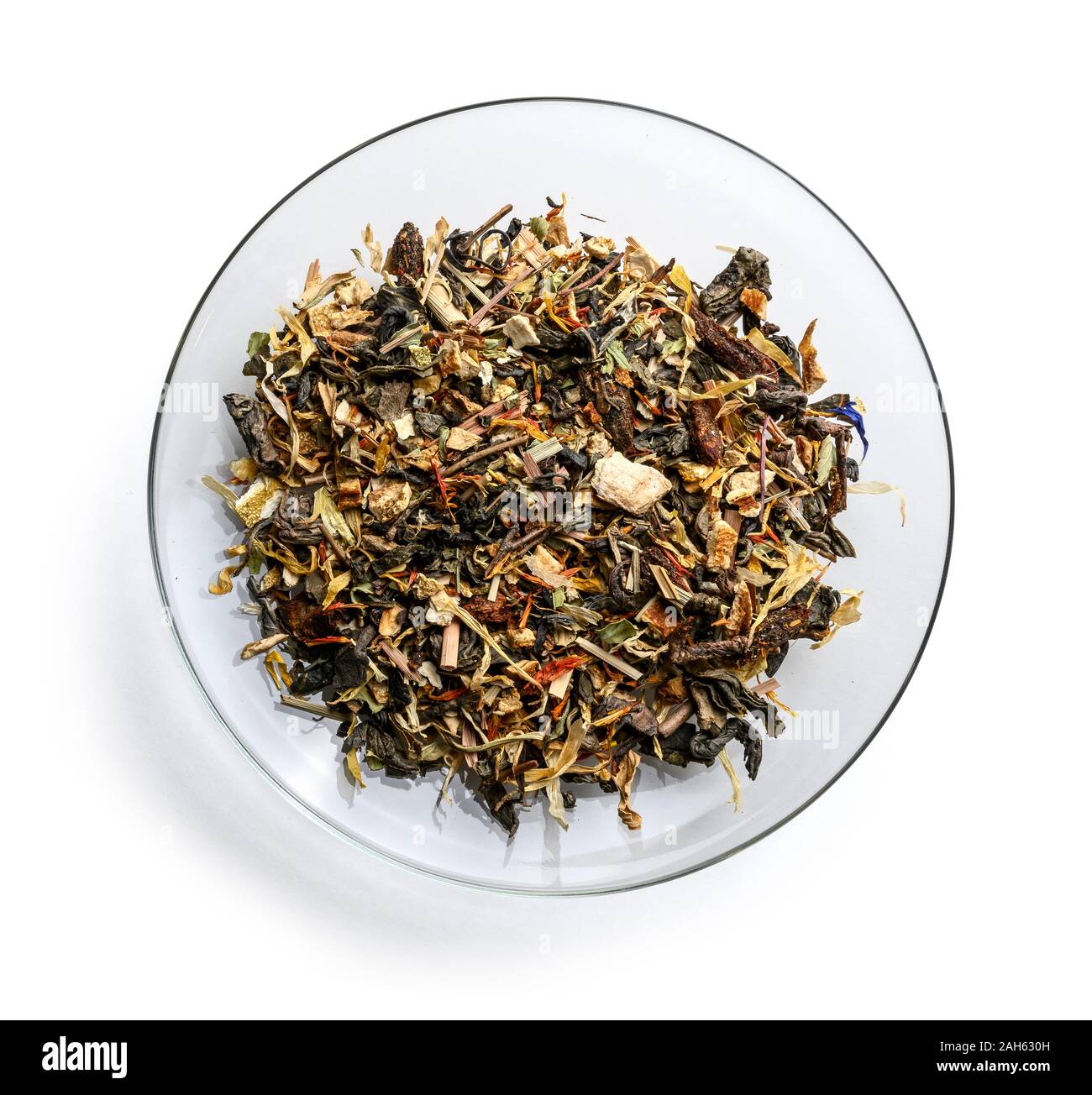 Green tea with aromatic additives. Top view on white background Stock ...