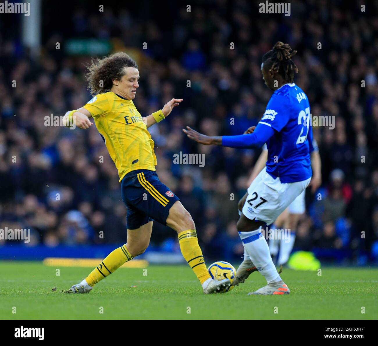 21st December 2019, Goodison Park, Liverpool, England; Premier League, Everton v Arsenal : David Luiz (23) of Arsenal challenges Moise Kean (27) of Everton for the ball Credit: Conor Molloy/News Images Stock Photo