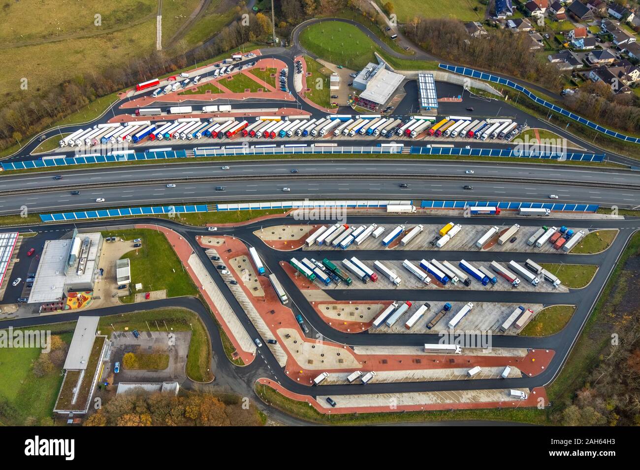 Aerial photograph, Autobahn A45, highway rest area Sauerland West, rest area Sauerland East, parking spaces for trucks, Lüdenscheid, Märkischer Kreis, Stock Photo