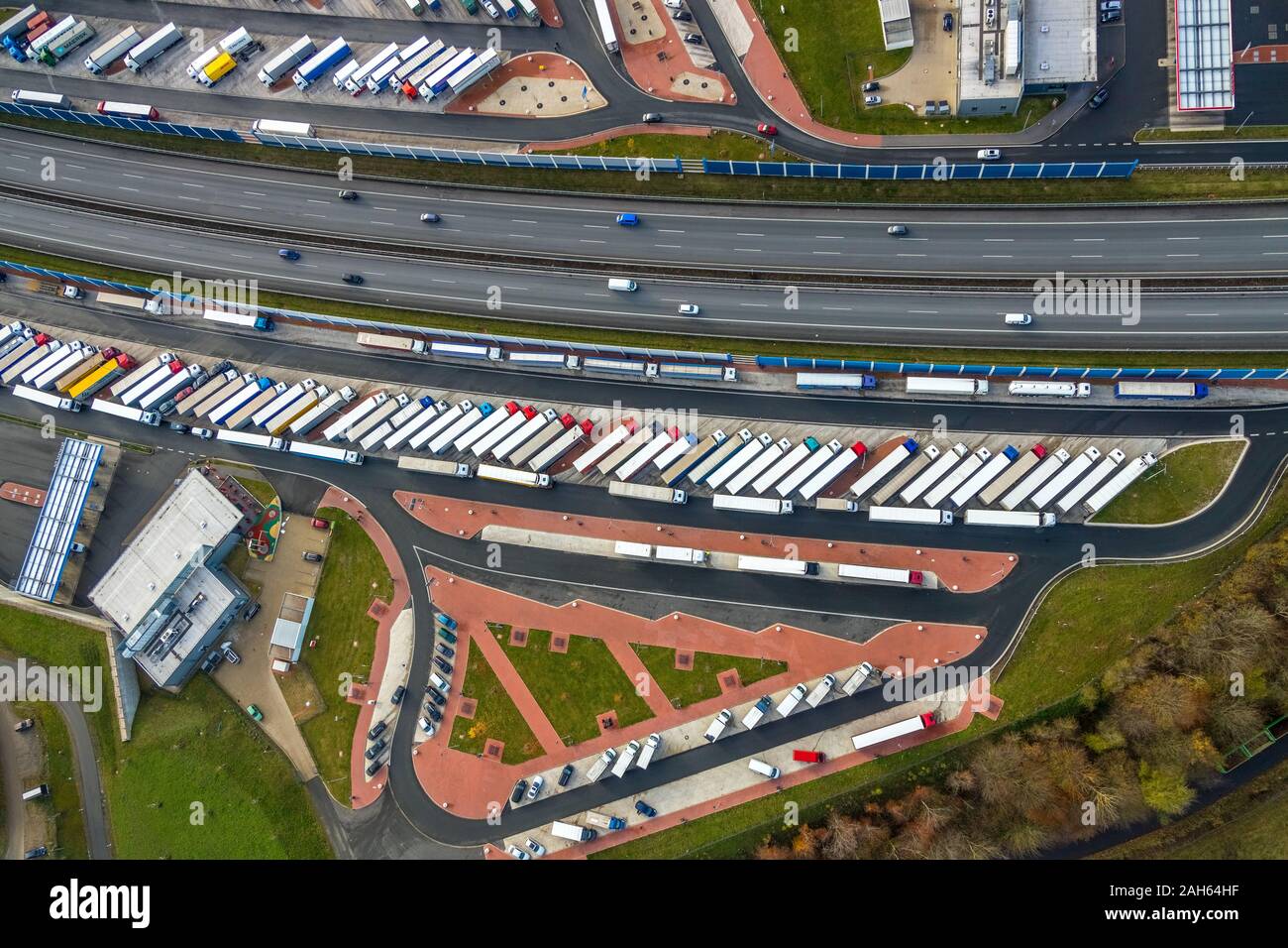 Aerial photograph, Autobahn A45, highway rest area Sauerland West, rest area Sauerland East, parking spaces for trucks, Lüdenscheid, Märkischer Kreis, Stock Photo