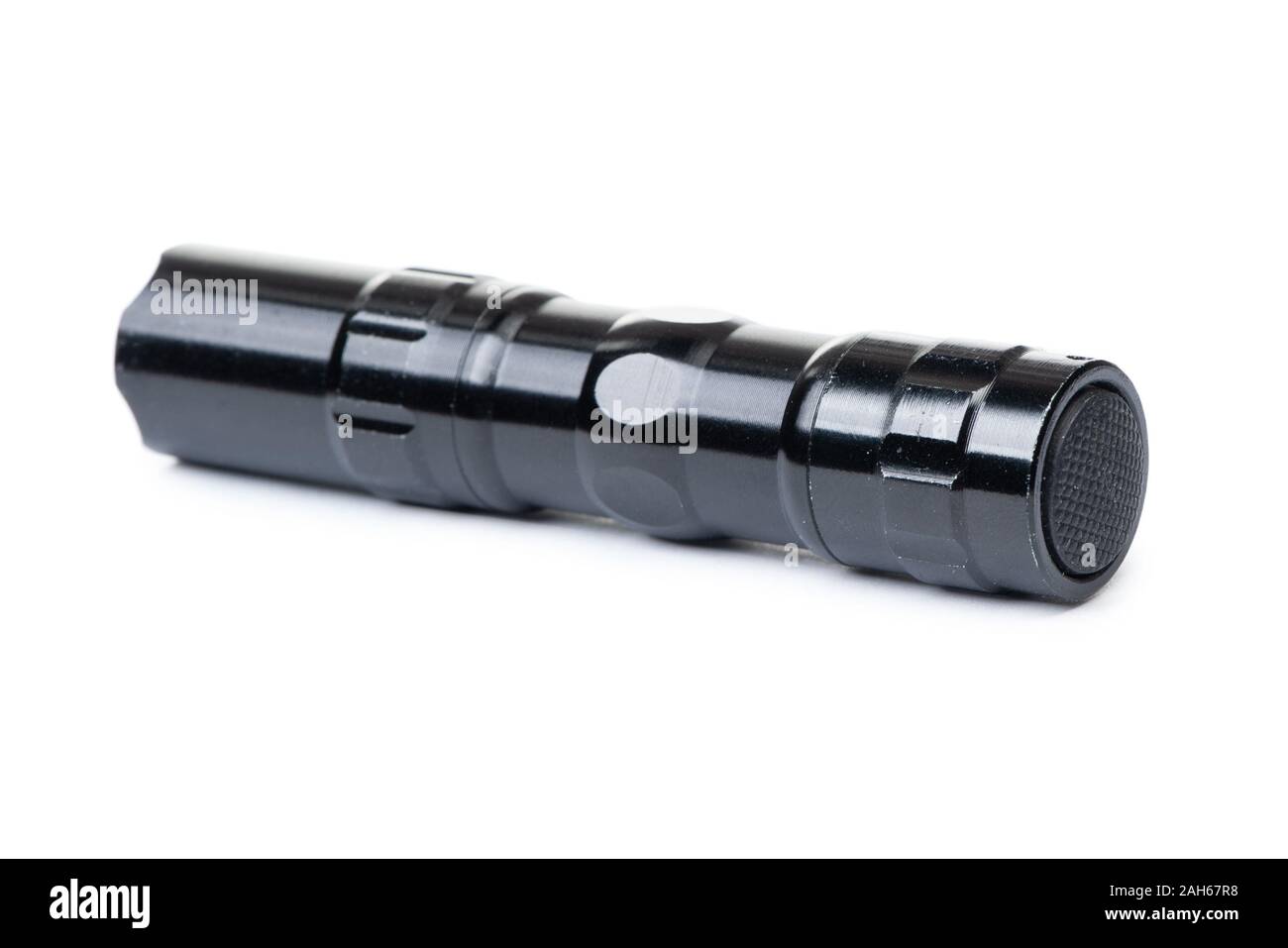 Old black flashlight isolated on white background Stock Photo