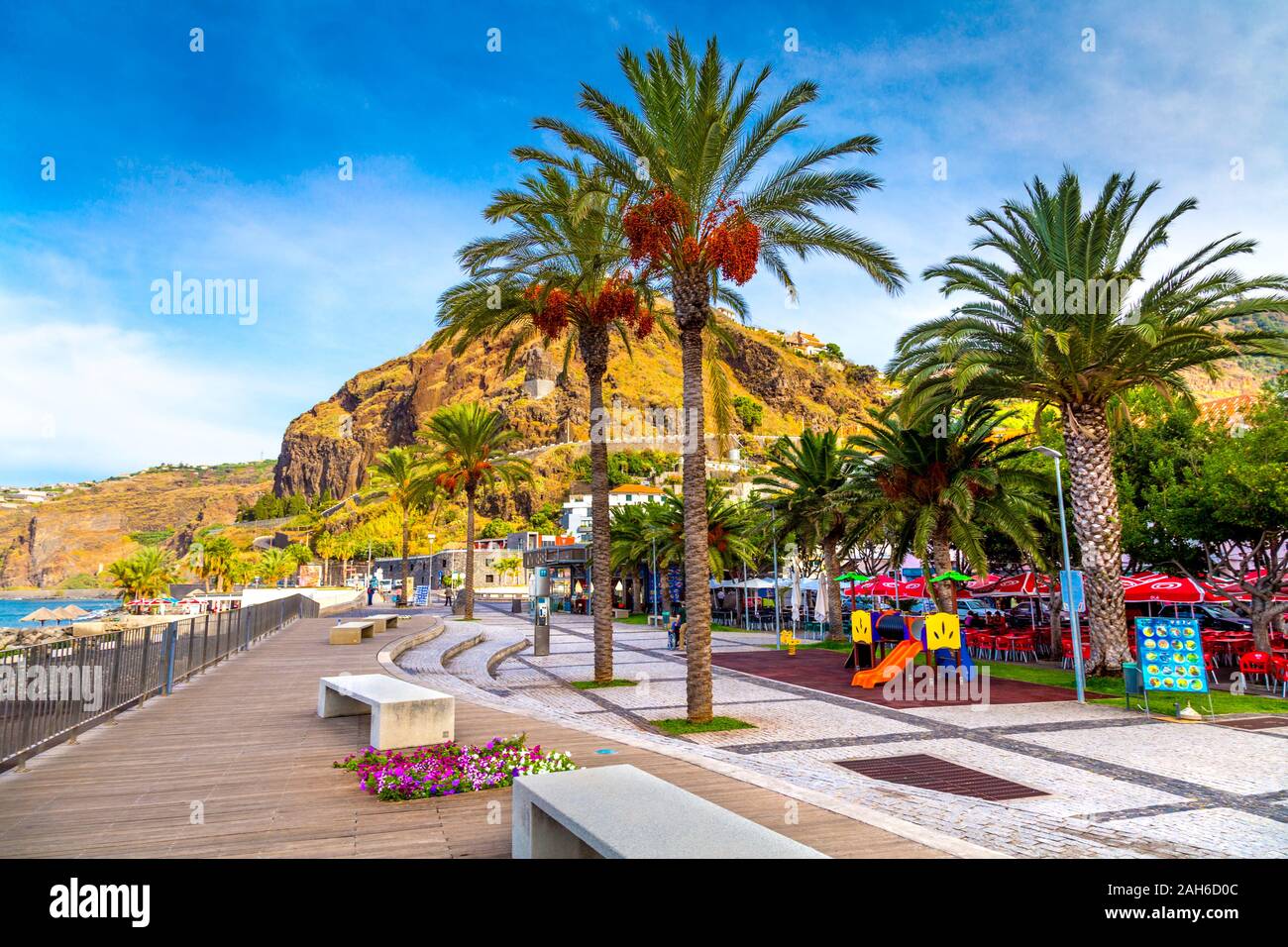 Palm trees and seaside promenade in Riberia Brava, Madeira, Portugal Stock Photo
