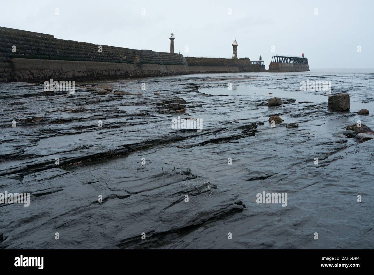 Whitby coast beyond the east pier Stock Photo - Alamy