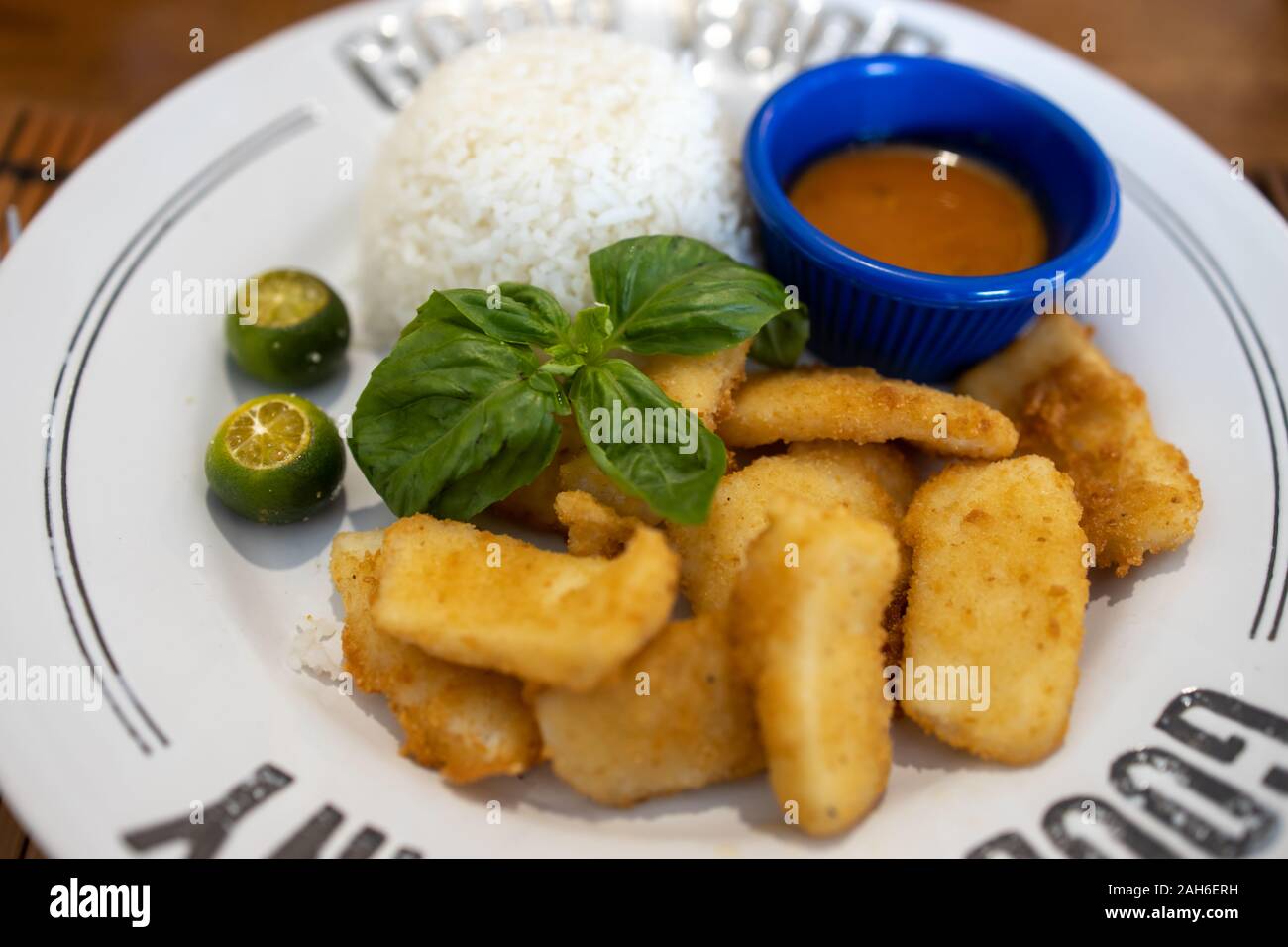 Fried squid with rice, Philippines Stock Photo - Alamy