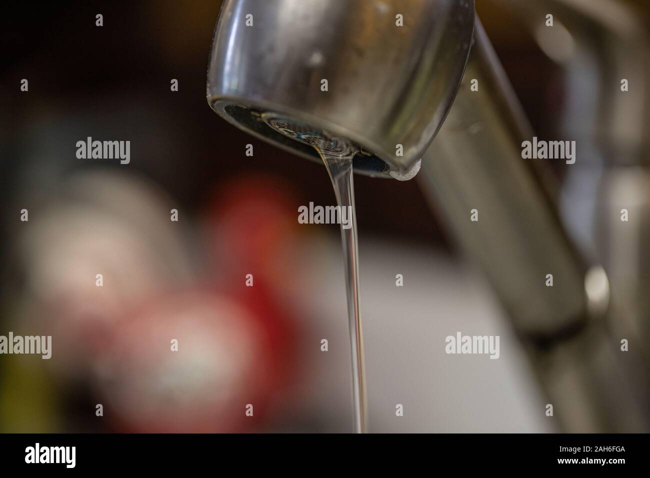 Water dripping slowly from faucet Stock Photo Alamy