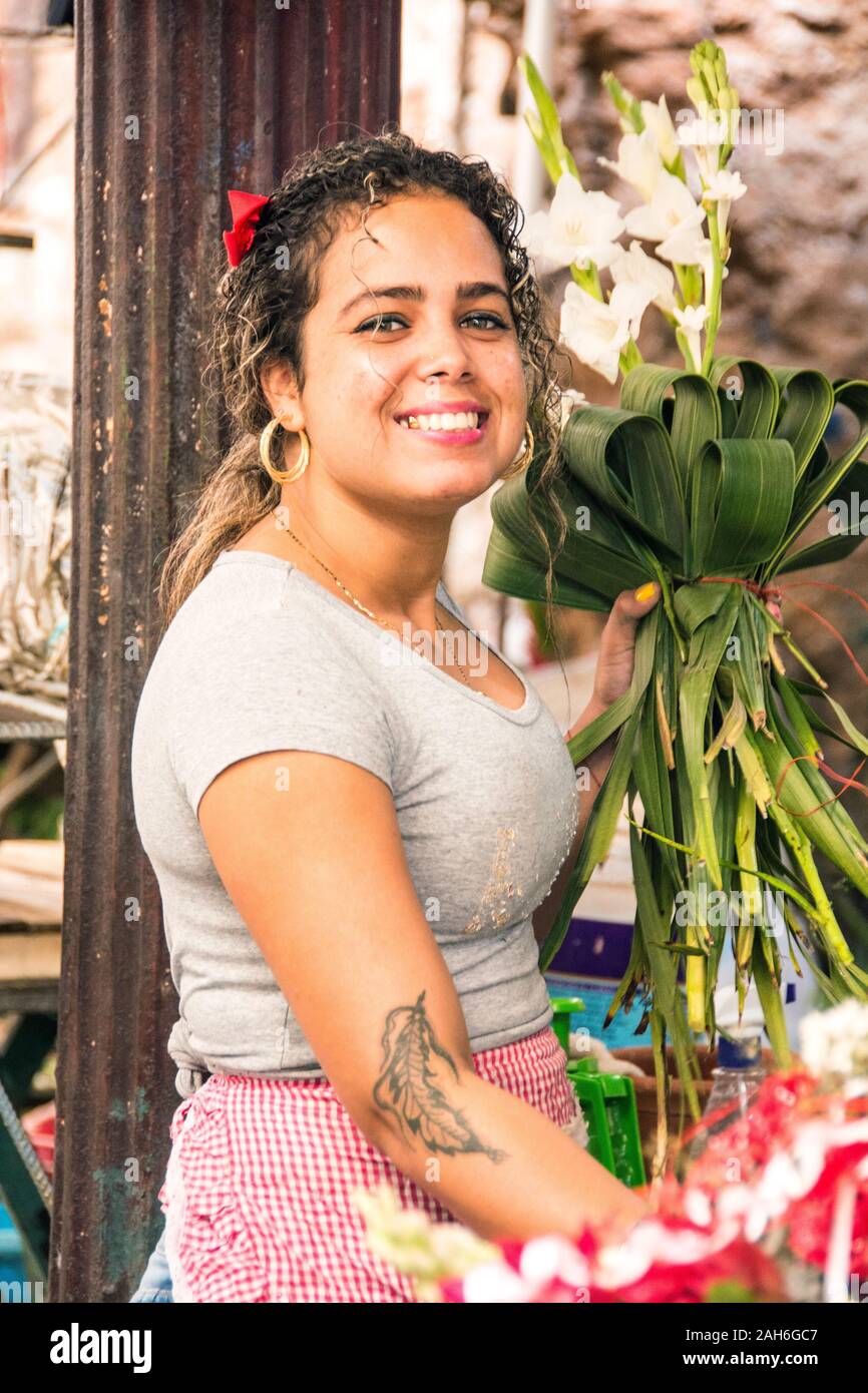 People of Havana Series - A Cuban florist, pausing for a photograph. Stock Photo