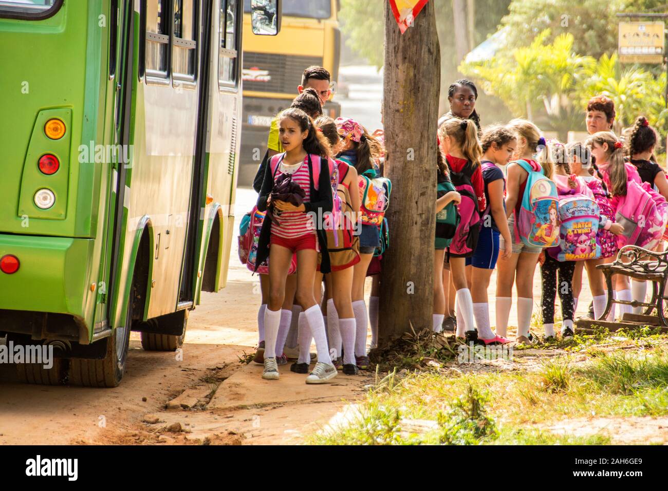 People of Havana Series - A busload of Junior High school students getting ready to board a bus. Stock Photo