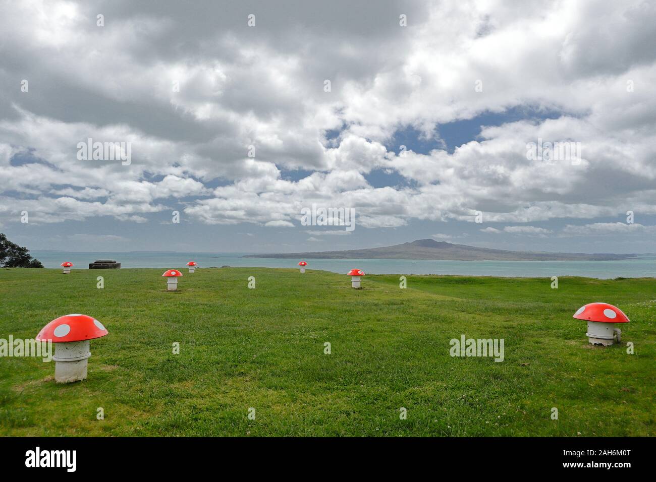 View of Rangitoto Island overlooking mushroom shaped air vents from the summit of Mount Victoria in Devonport, Auckland, New Zealand Stock Photo