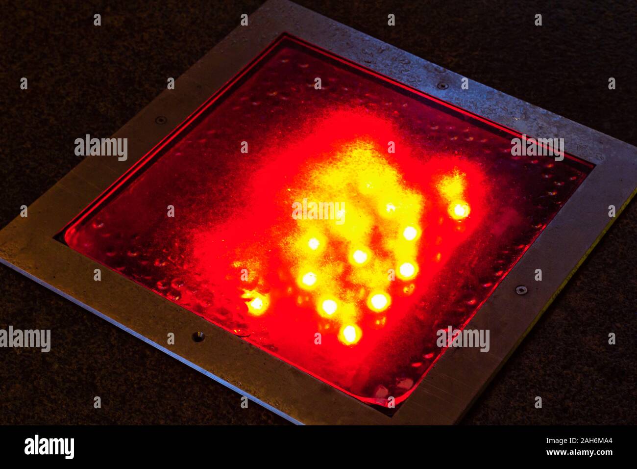building outdoor lamp outdoor lighting red spectrum Stock Photo - Alamy