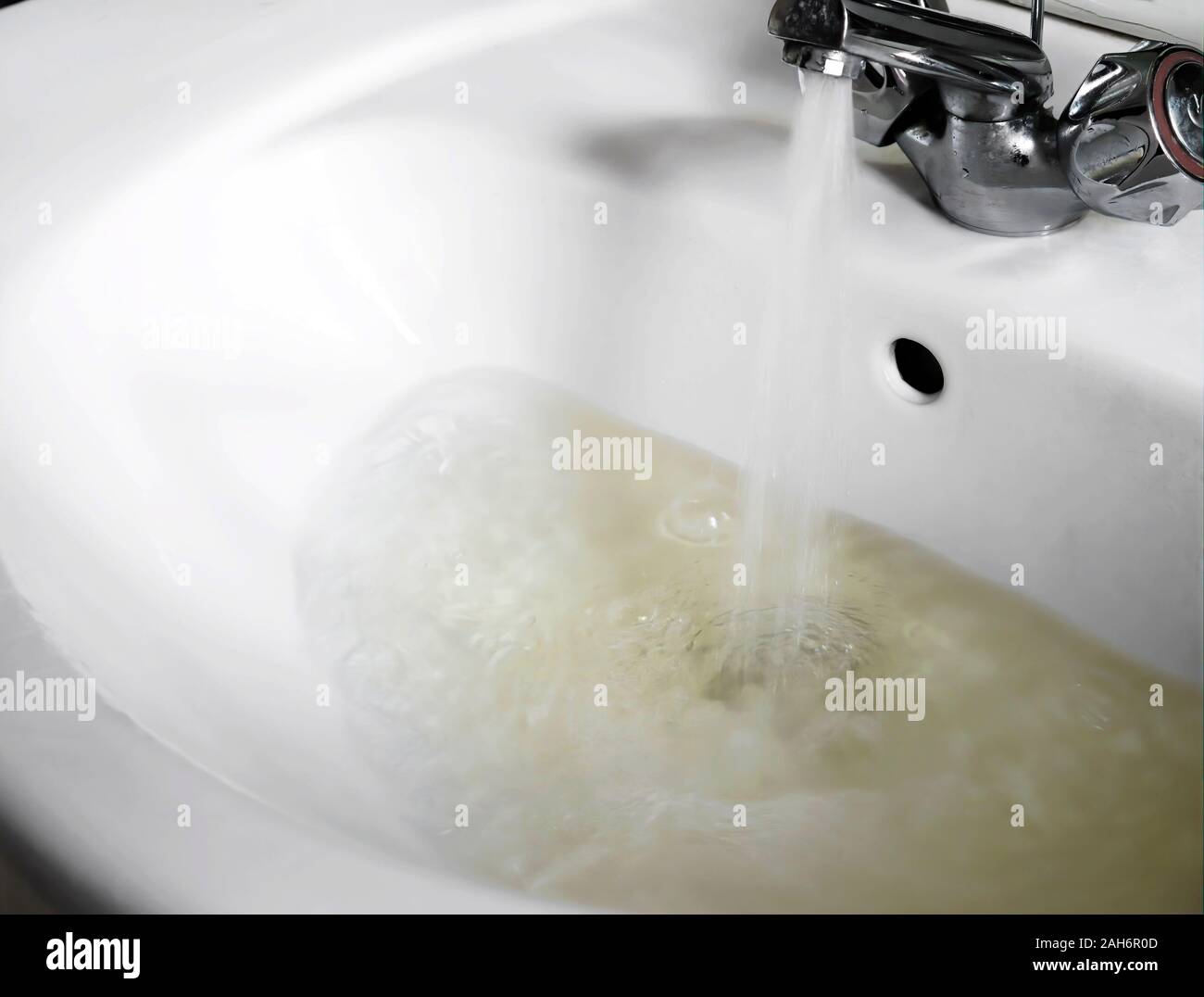 Poor quality water supply, flows from tap into domestic bathroom sink