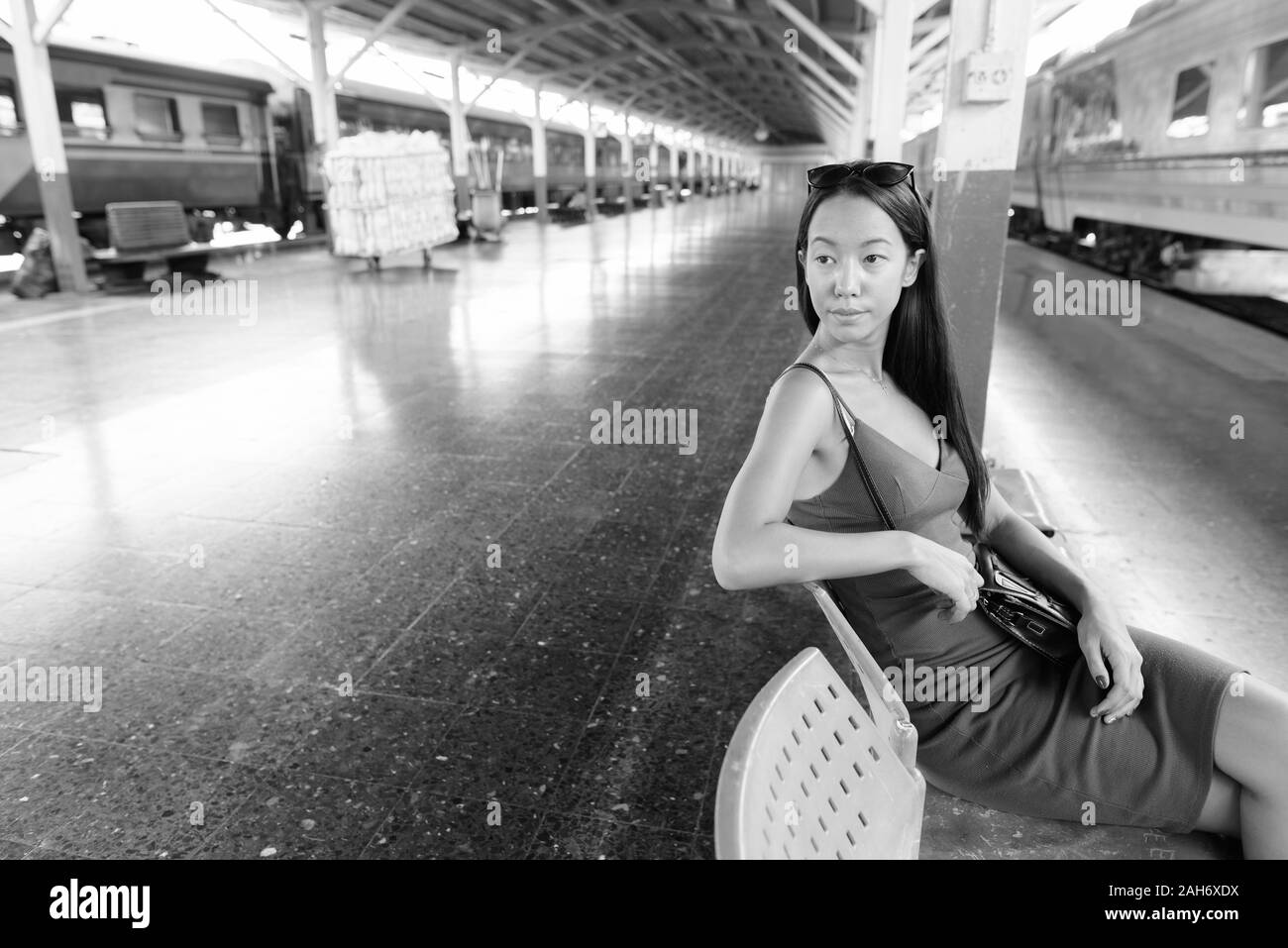 Young beautiful tourist woman exploring the city of Bangkok Stock Photo