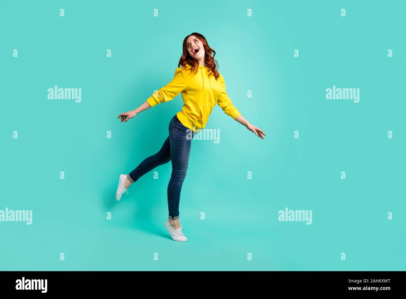 Full length body size photo of cute charming cheerful sweet pretty girl