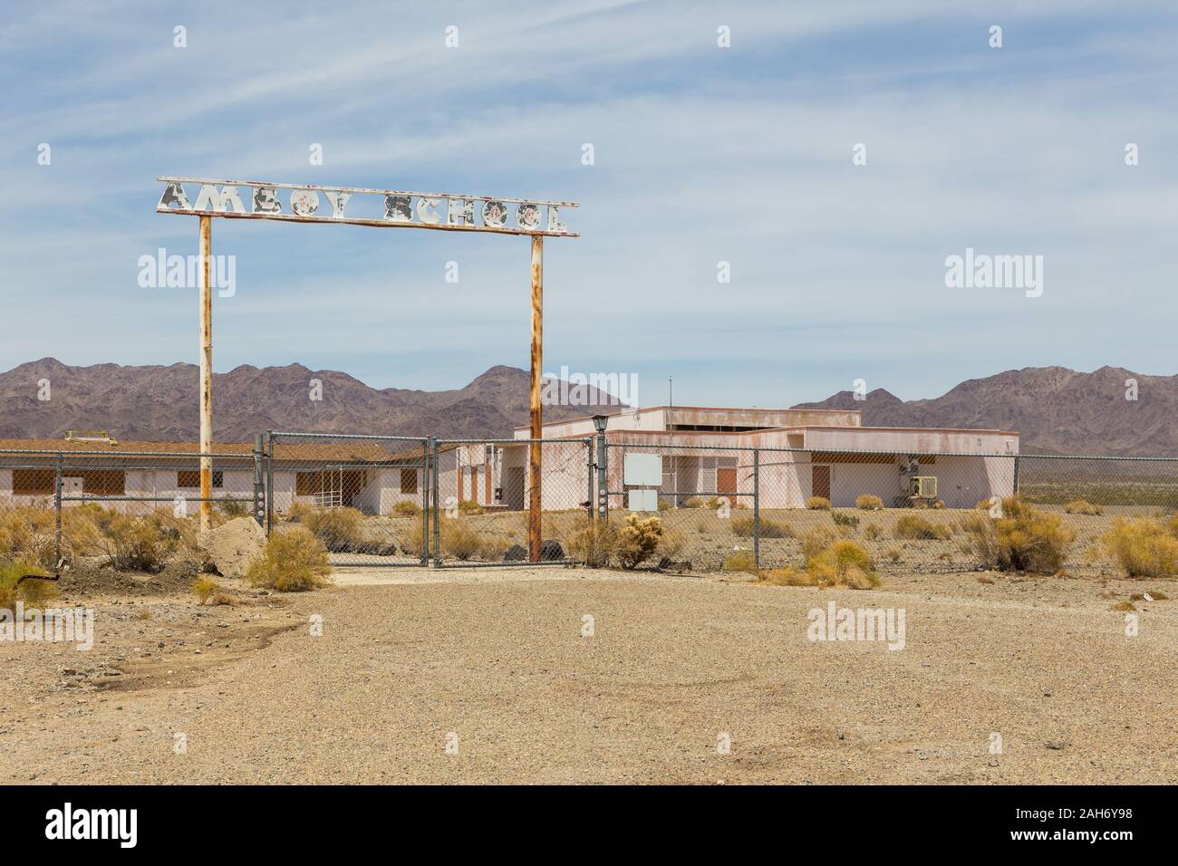 Fenced, abandoned school building, Amboy, California, USA Stock Photo