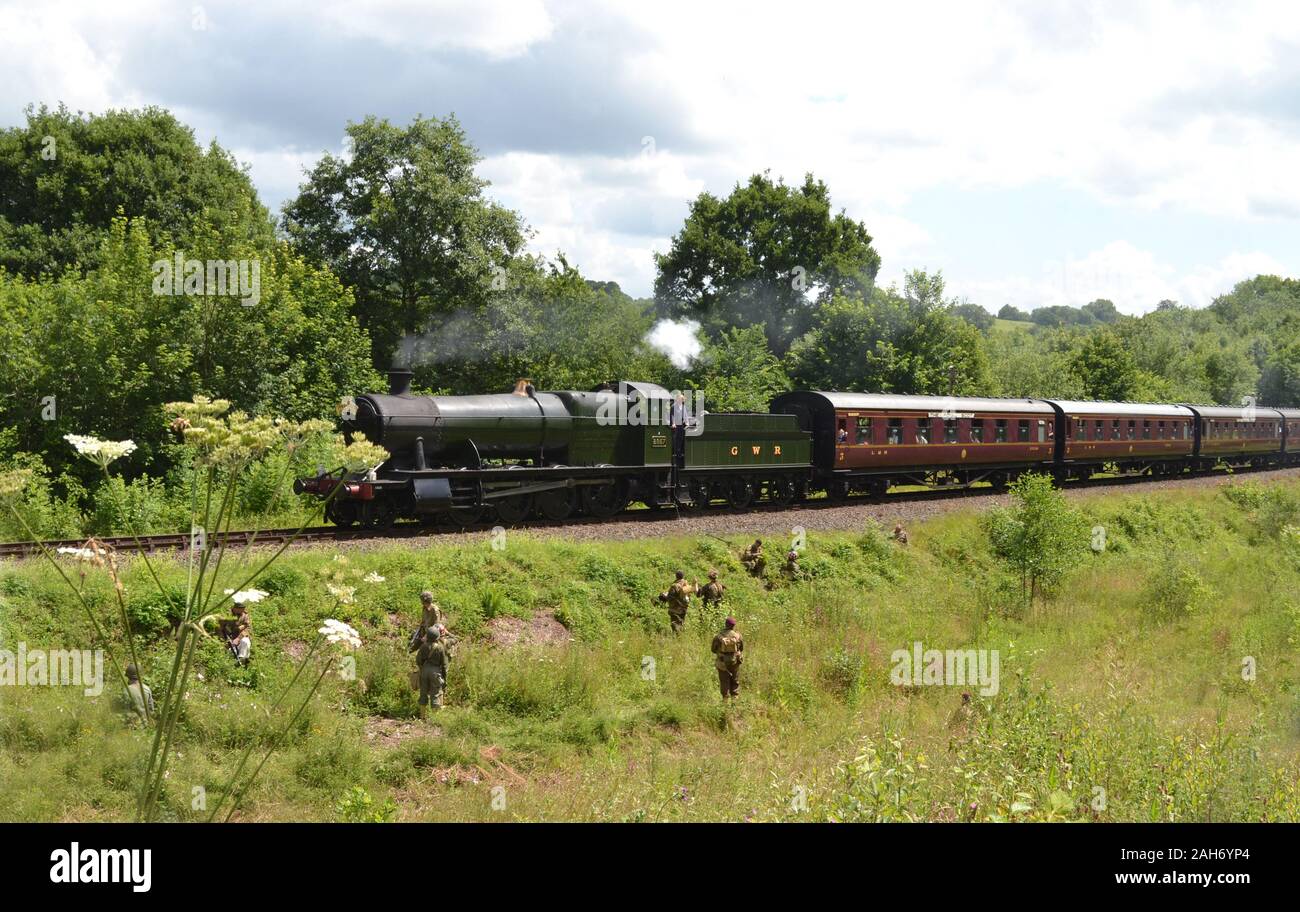 Soldiers about to ambush a steam train during a 1940s weekend, on the Severn Valley Railway, Shropshire, UK Stock Photo