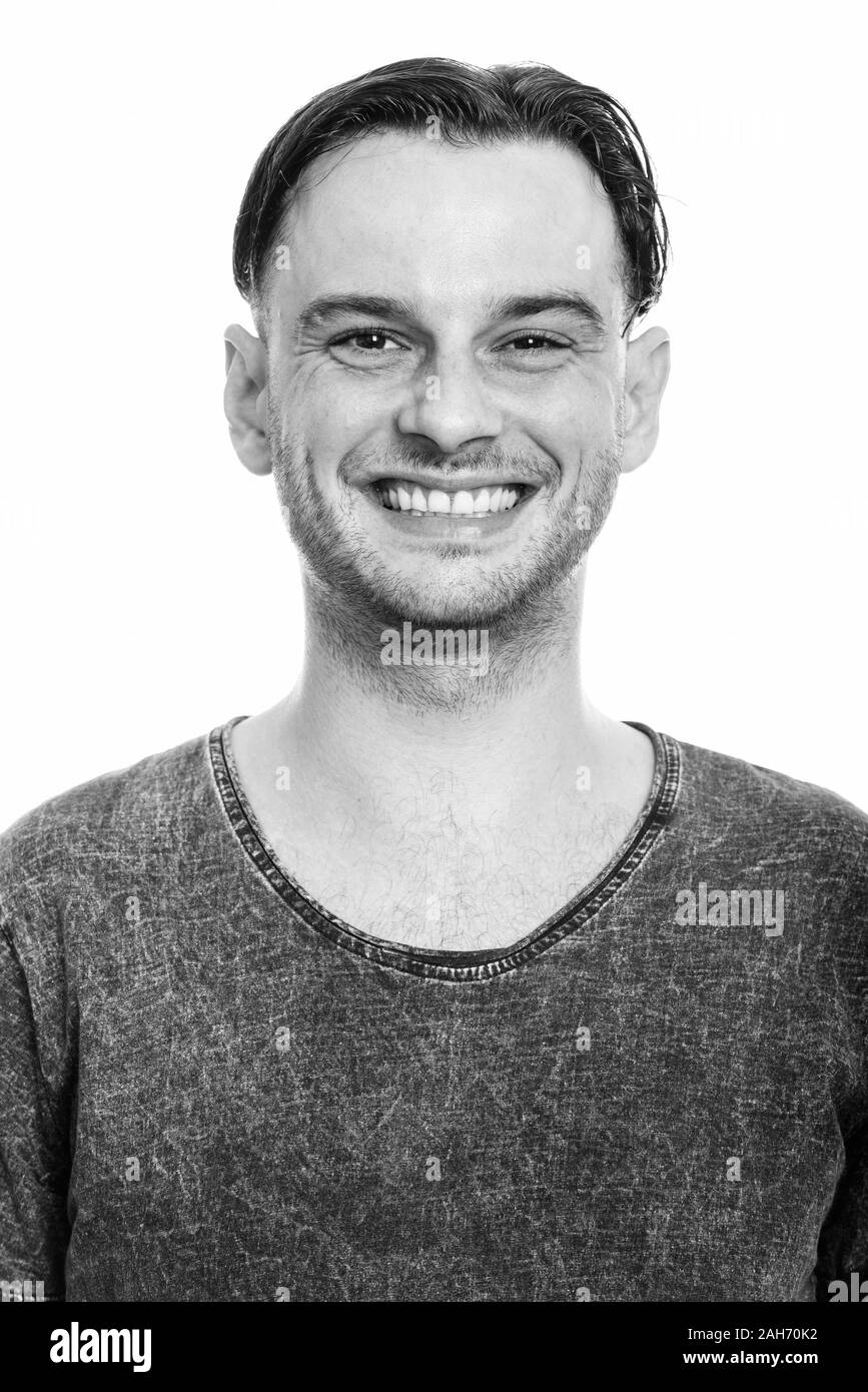 Face of young happy man smiling in black and white Stock Photo - Alamy