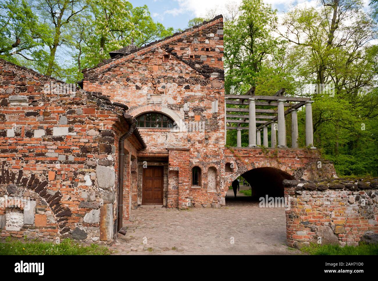 Przybytek Arcykapłana outside view, the High Priest Sanctuary building in the Romantic Park in Arkadia, Poland, Europe, red bricks architecture, visit Stock Photo