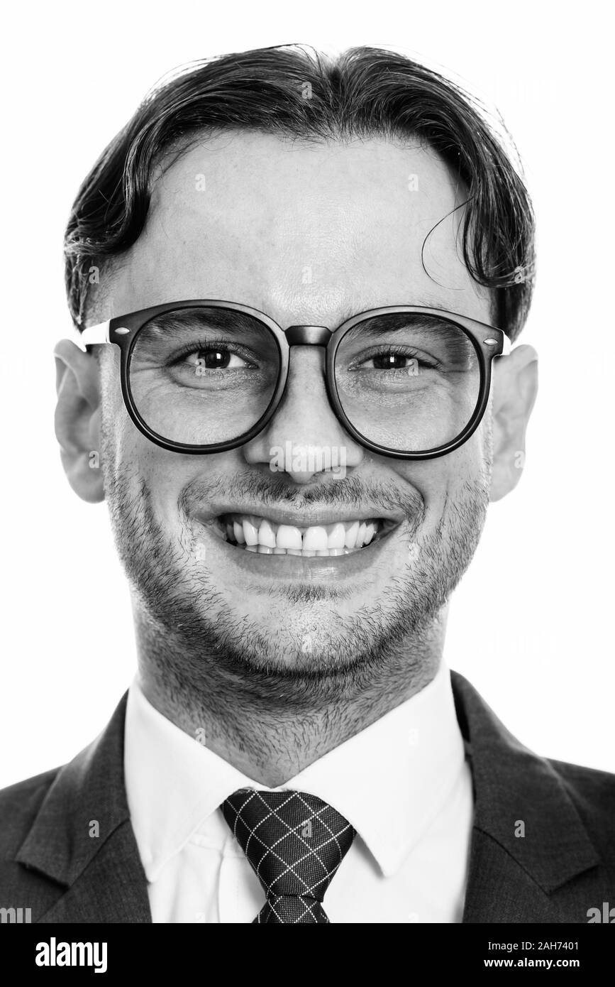 Face of young happy businessman smiling while wearing eyeglasses Stock ...