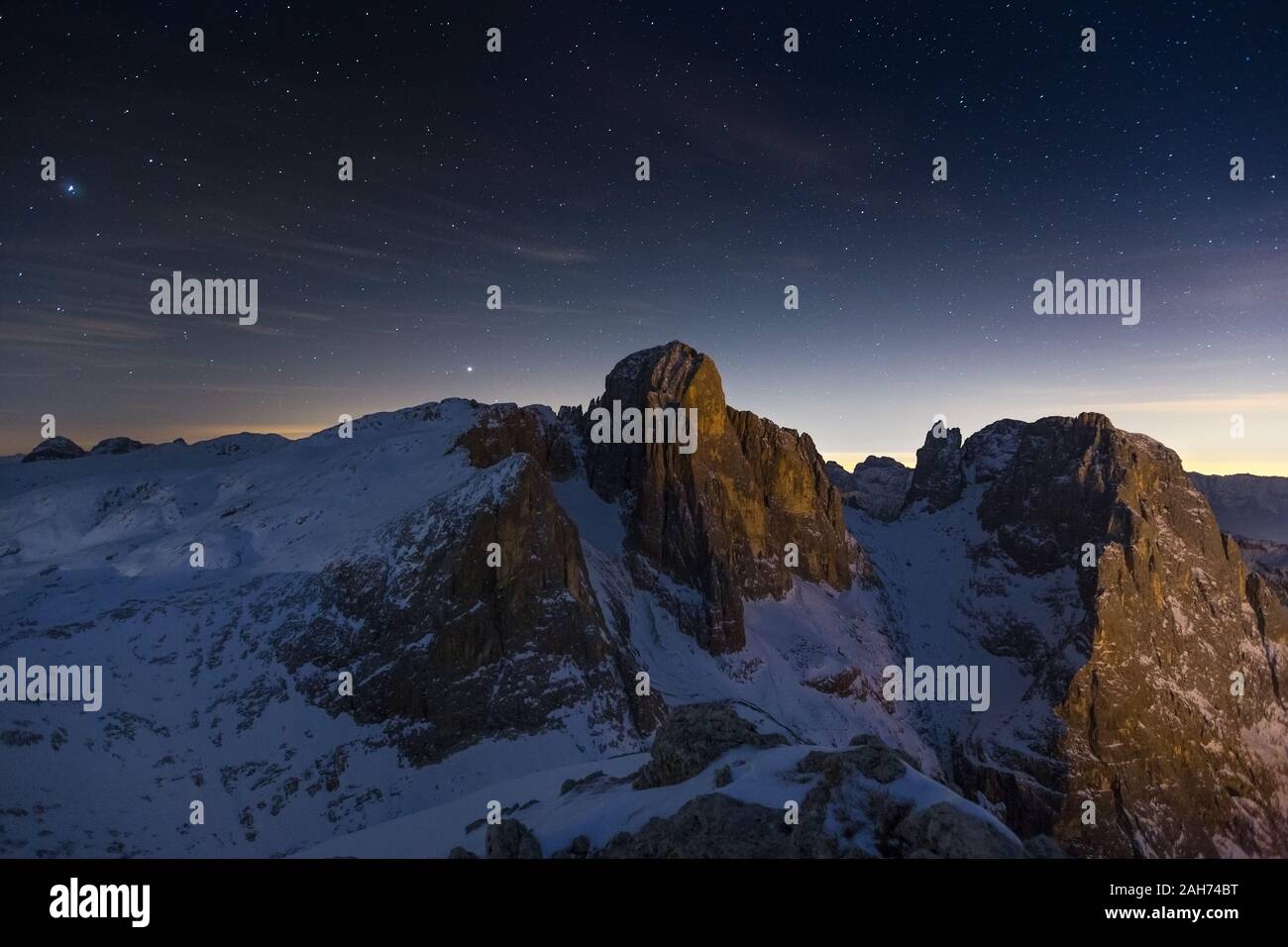 The Pale di San Martino group at night. Pala peak. The Dolomites of Trentino. Night mountain landscape, starry sky. Primiero. Italian Alps. Europe. Stock Photo