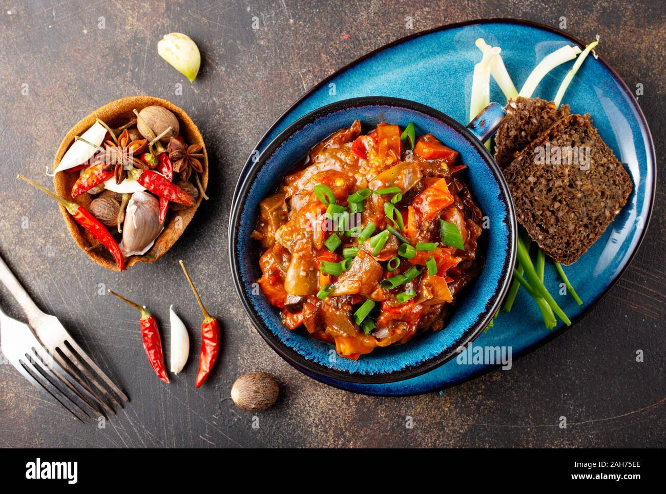 Fried cabbage with meat and tomato pasta Stock Photo Alamy