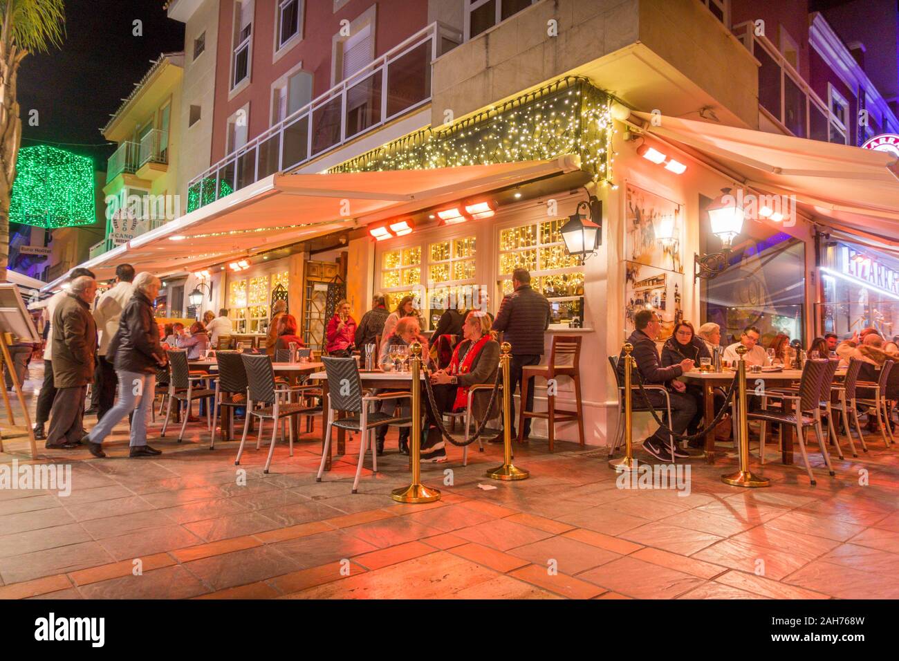 Nightlife in Fuengirola with bars and restaurants, during Christmas.  Fuengirola, Andalucia, Spain Stock Photo - Alamy