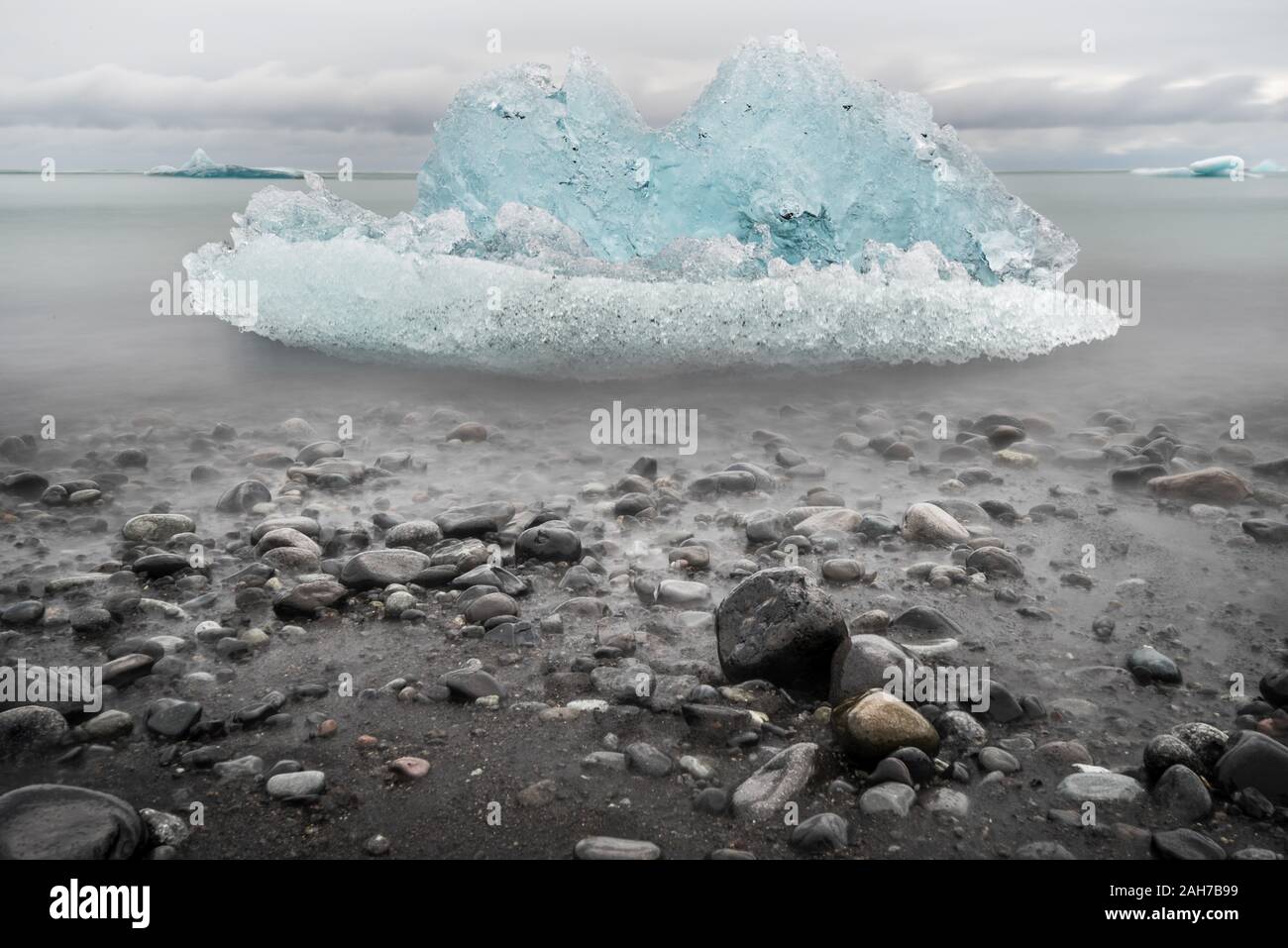 Iceberg With Rocks Iceberg Beach Stones Ice Melting Iceberg On Beach In Iceland Free