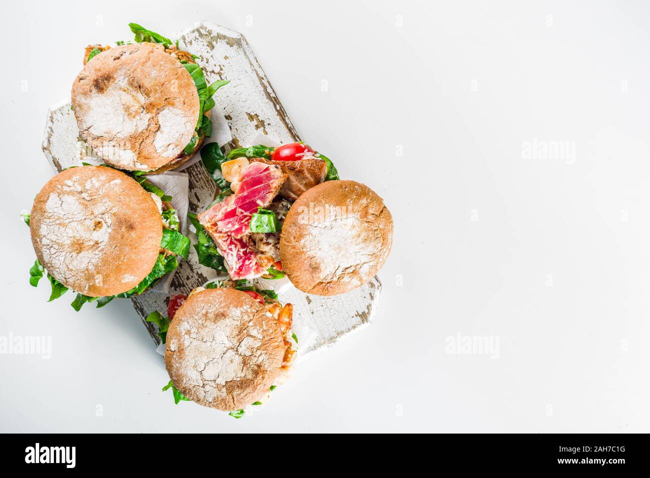 Various seafood and fish burgers assortment. Homemade healthy burger