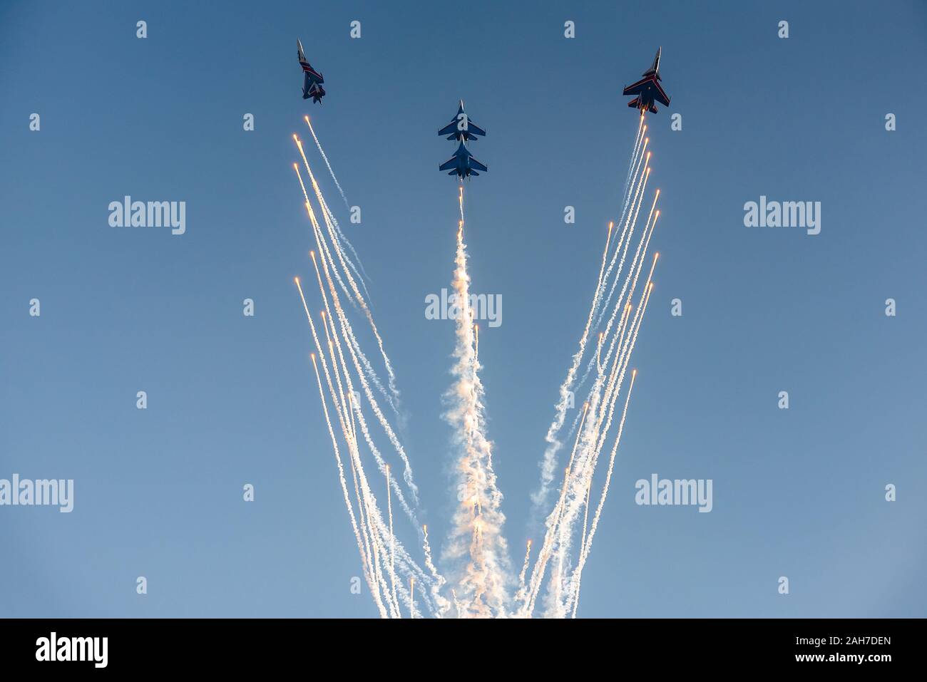Sukhoi Su-30 jet fighter jets of the Russian Knights aerobatics team performing formation flight during MAKS 2019 airshow, Zhukovsky, Russia. Stock Photo