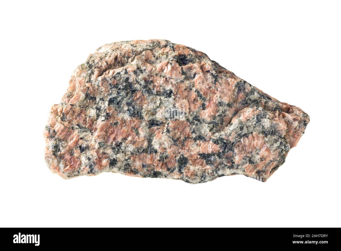 Granite stone with red, gray and white grains isolated on a white background Stock Photo