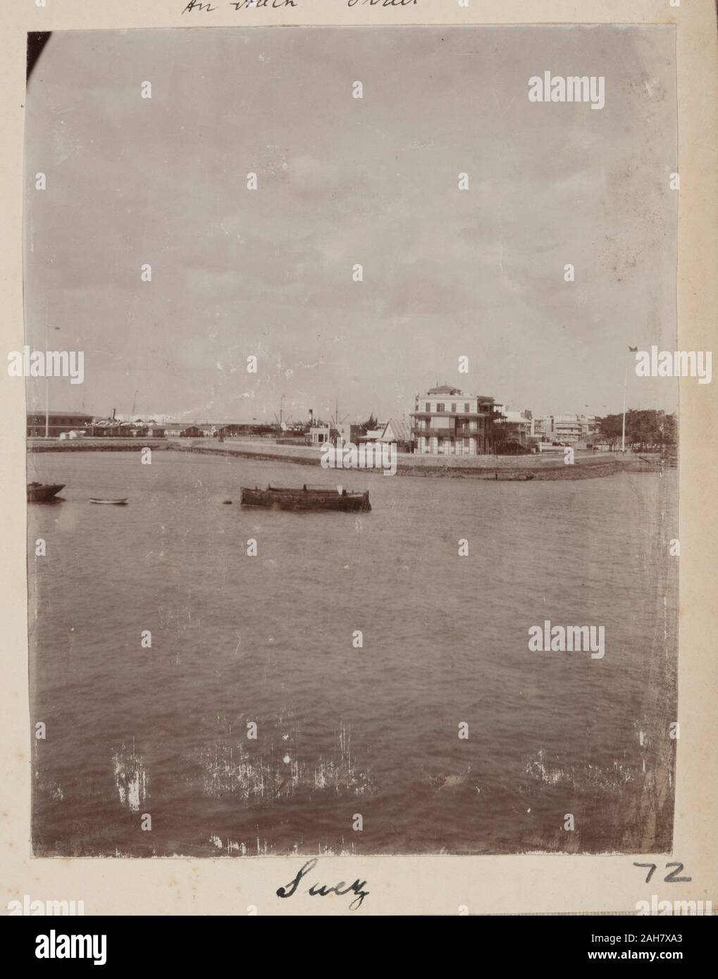 Egypt, View of buildings seen across the Suez canalOriginal manuscript caption: Suez, circa 1910. 2005/078/1/72. Stock Photo