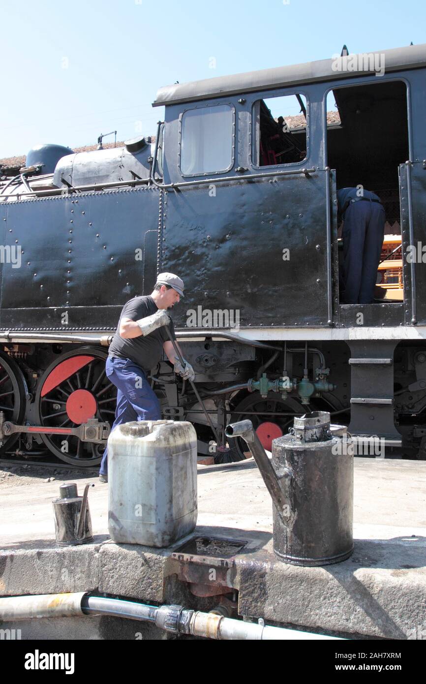 Chaves, Portugal - July 25, 2009: Old steam locomotive seeing his crew ...