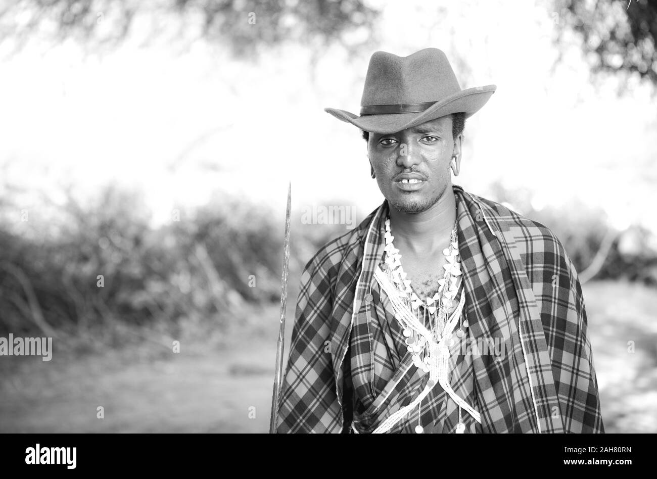handsome maasai warrior in a cowboy hat Stock Photo