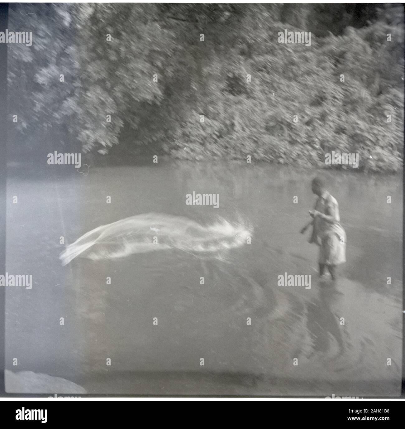 Image of Casting net, fishing, 15 April 1954 (b/w photo) [2012/001/6/7/S4]