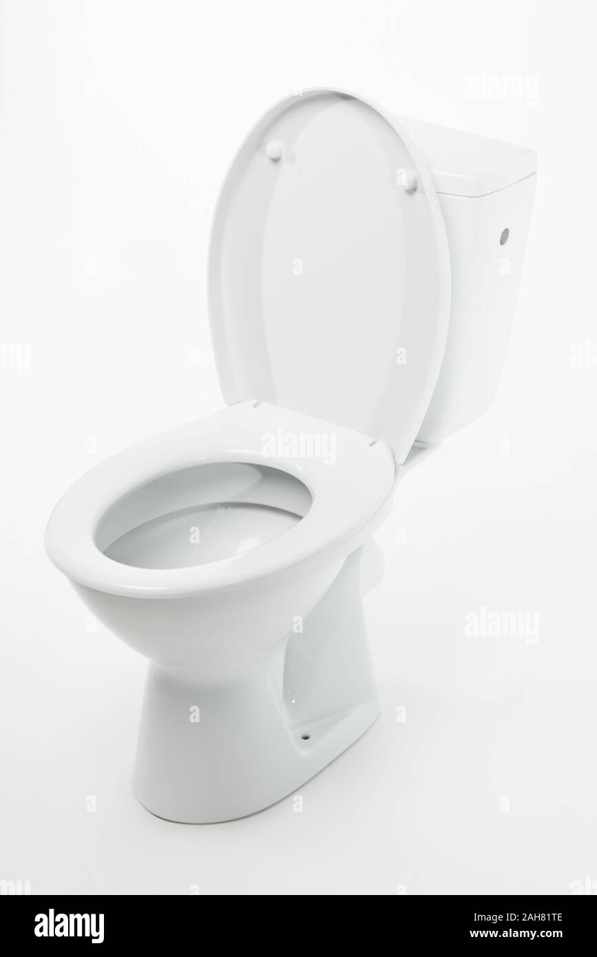 modern ceramic clean toilet bowl isolated on white Stock Photo - Alamy