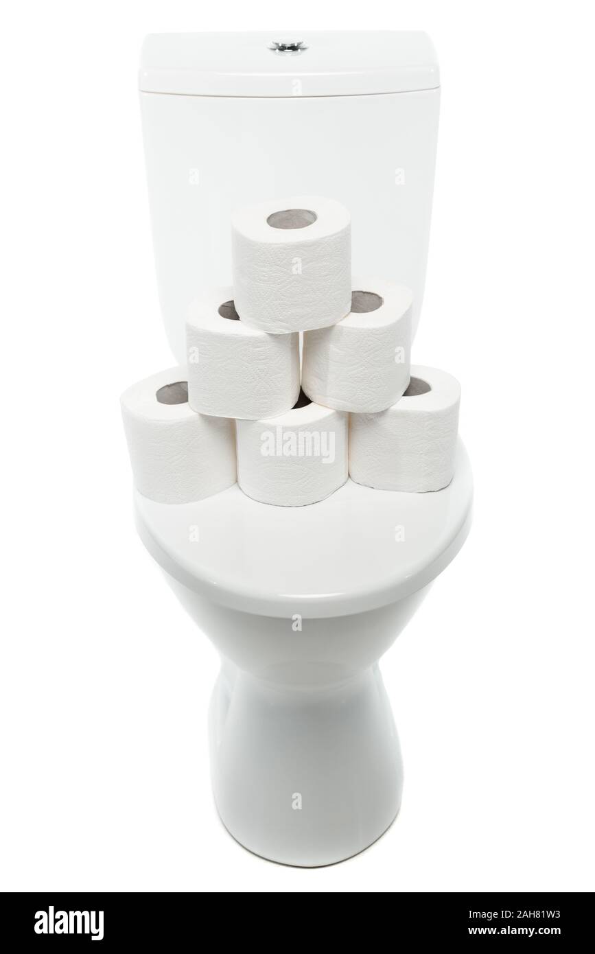 ceramic clean toilet bowl with rolls of toilet paper isolated on white ...