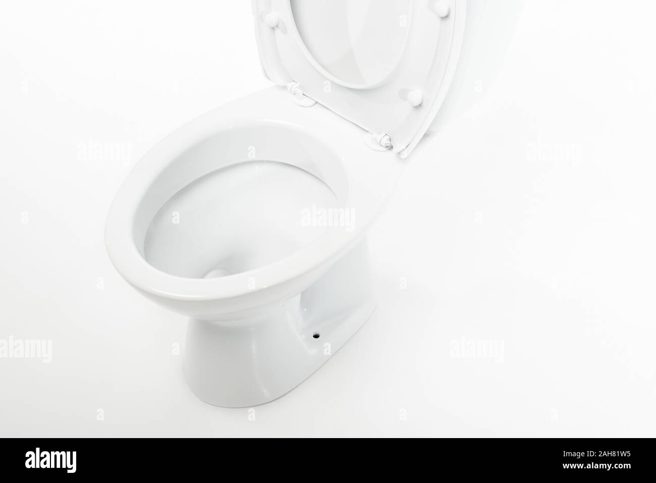 modern ceramic clean toilet bowl isolated on white Stock Photo - Alamy