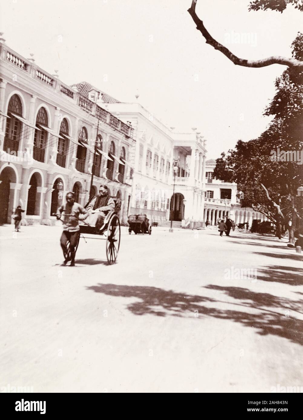 ChinaMacau, A rickshaw travels along the 'praya' (waterfront promenade ...