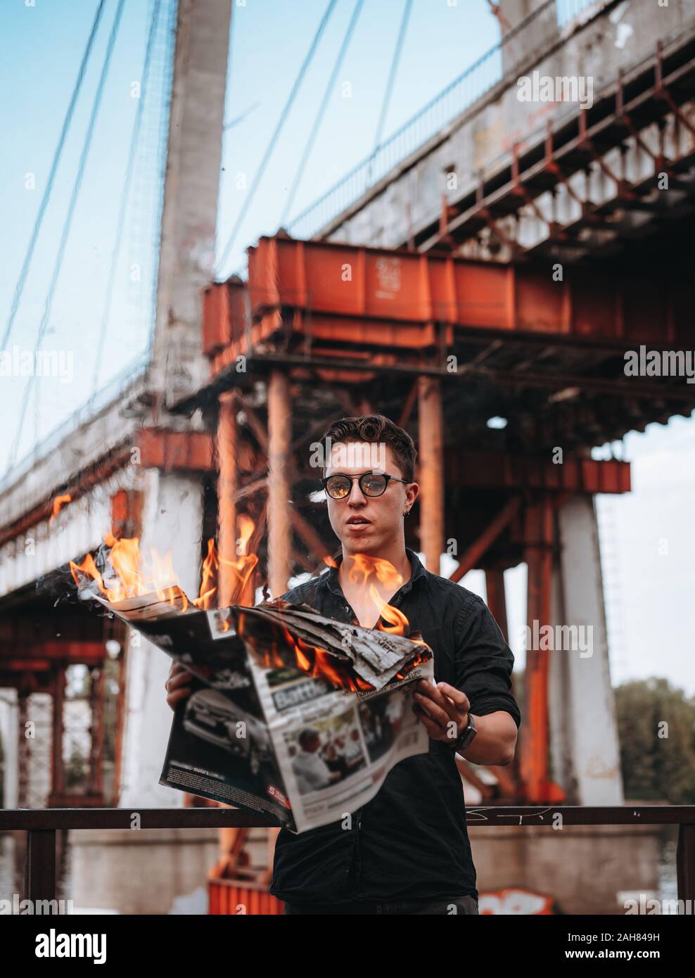 Burning newspaper hi-res stock photography and images - Alamy